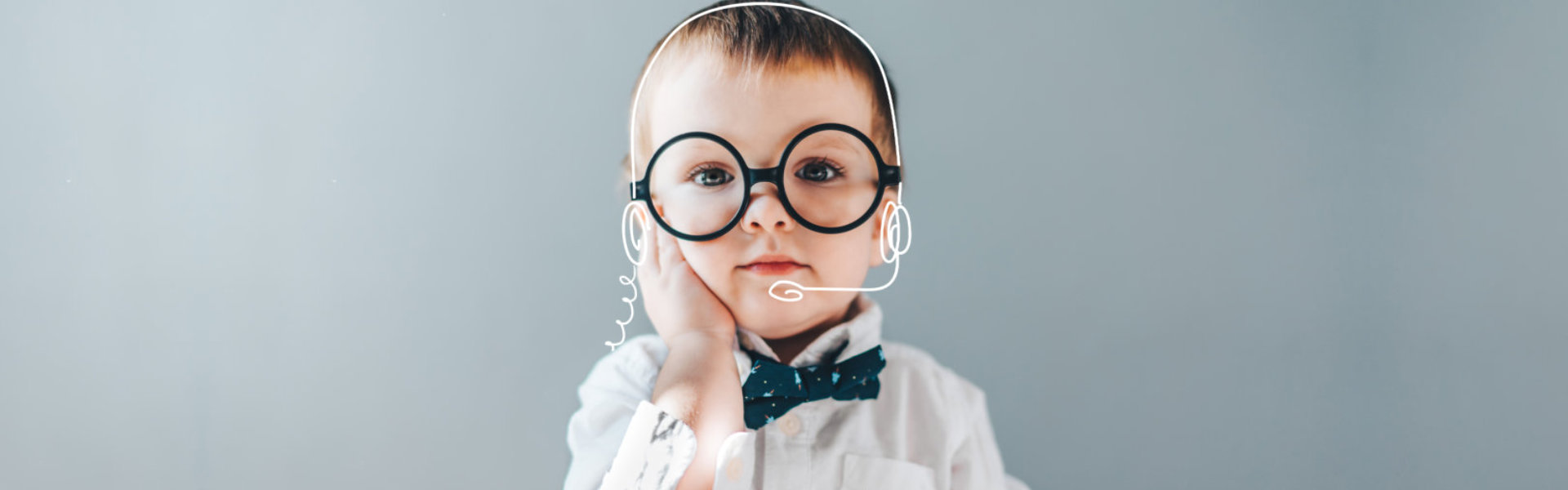 Cute little genius baby boy wearing smart outfit